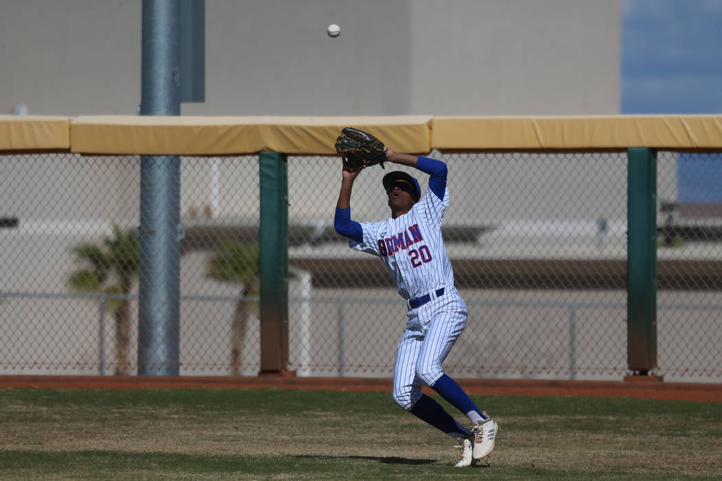 Bishop Gorman's Noah Gulley (20) makes a catch in the outfield against Desert Oasis in the baseball game at Bishop Gorman High School in Las Vegas, Thursday, March 21, 2019. Desert Oasis won 4-0. ...
