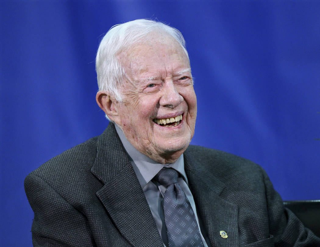 File-This Sept. 12, 2018, file photo shows former President Jimmy Carter, 93, answering questions from students during his annual town hall with Emory University in Atlanta. Carter said Friday, ja ...