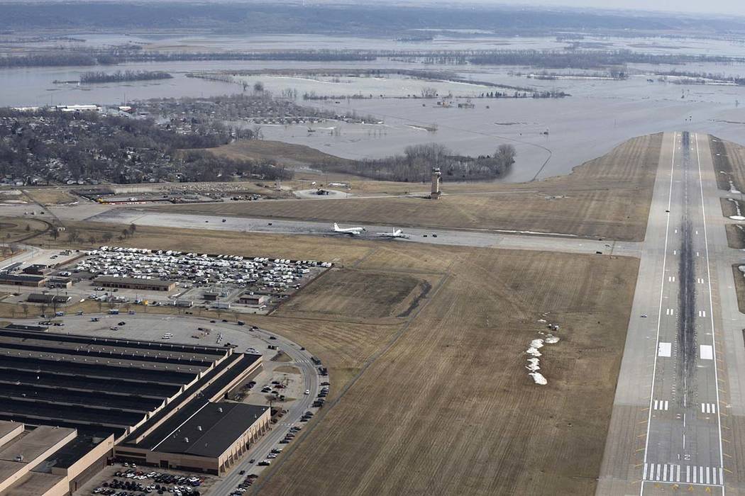 This March 17, 2019 photo released by the U.S. Air Force shows an aerial view of Offutt Air Force Base and the surrounding areas affected by floods in Nebraska (Tech. Sgt. Rachelle Blake/The U.S. ...