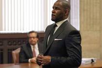 R. Kelly appears for a hearing at the Leighton Criminal Court Building on Friday, March 22, 2019 in Chicago. An overseas trip by R. Kelly is in limbo after his criminal attorney asked for more tim ...