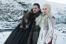 Kit Harington and Emilia Clarke appear in a scene from "Game of Thrones." (Helen Sloane/HBO)