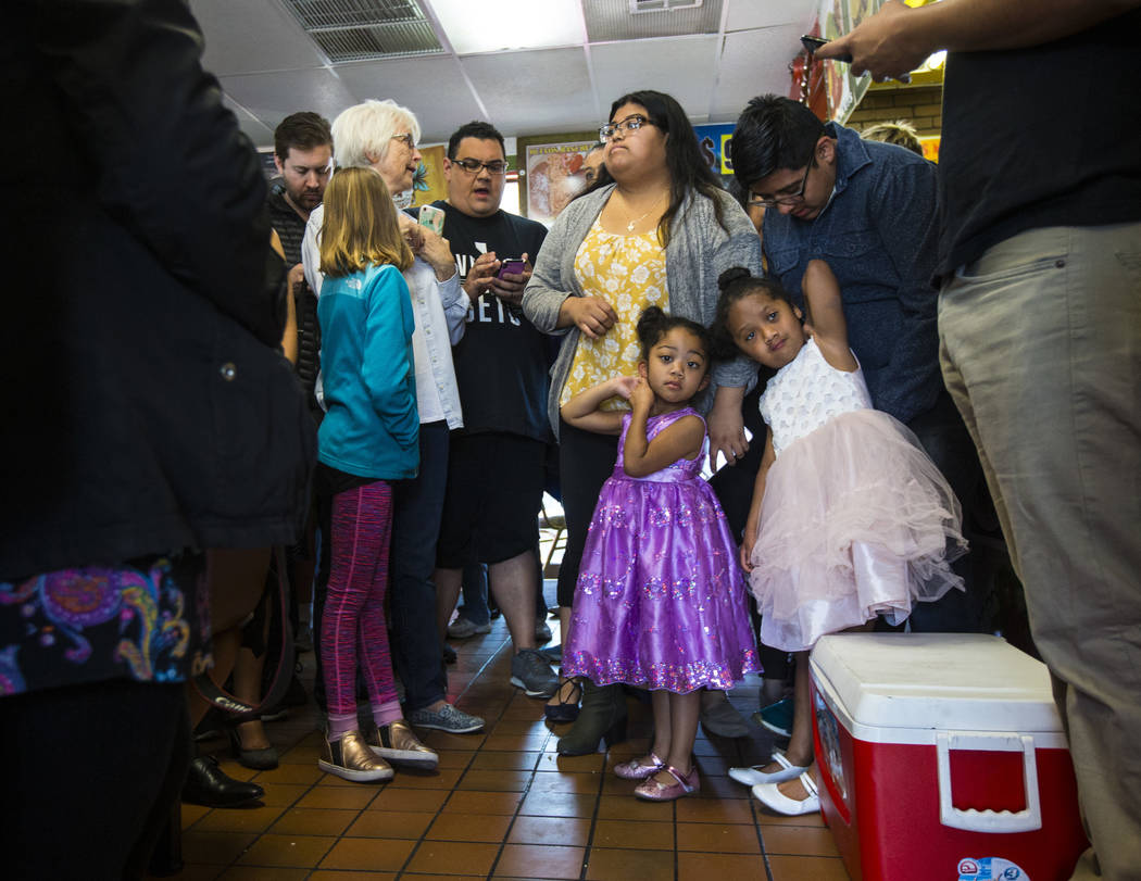Natalie Guigui, 4, center, and sister Scarlett-Marie Guigui, 5, both of Las Vegas, wait for Democratic presidential candidate and former Texas congressman Beto O'Rourke at a campaign stop at Arand ...