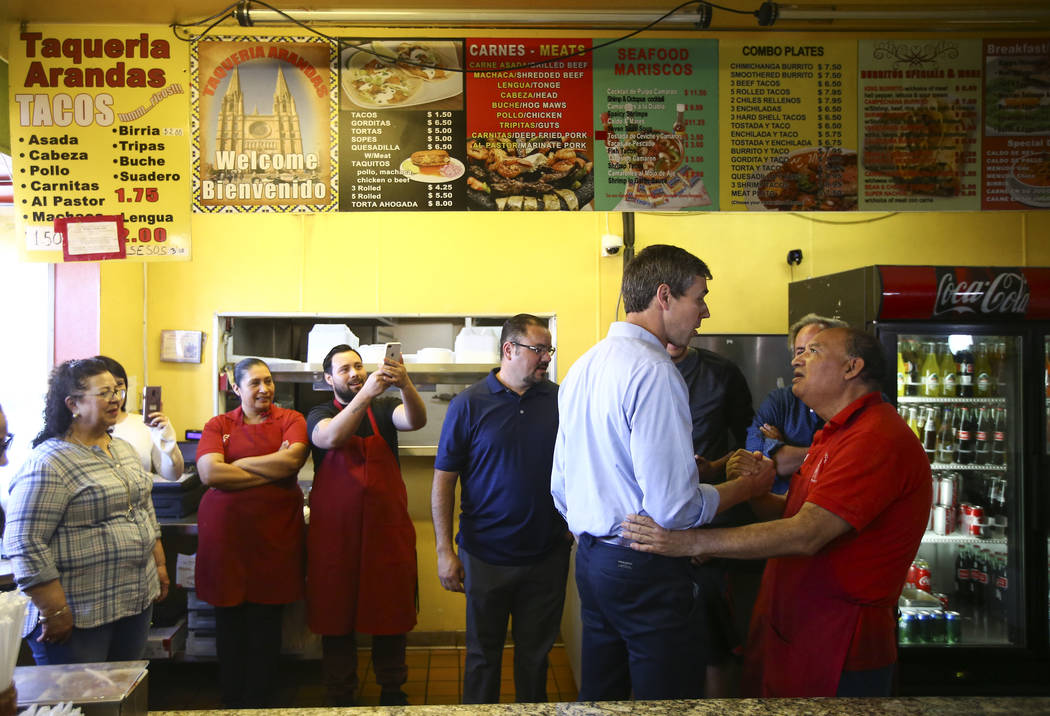 Democratic presidential candidate and former Texas congressman Beto O'Rourke greets employees at Arandas Taqueria during a campaign stop in Las Vegas on Sunday, March 24, 2019. (Chase Stevens/Las ...