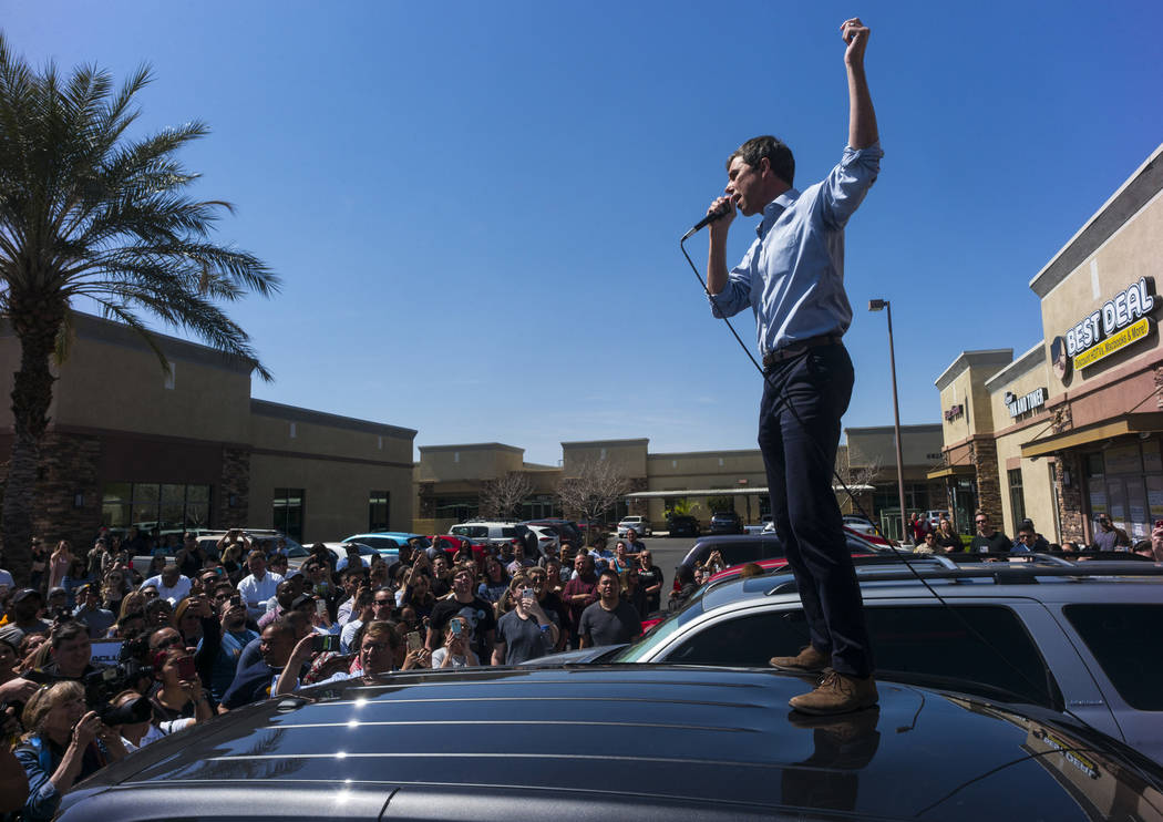 Democratic presidential candidate and former Texas congressman Beto O'Rourke acknowledges the crowd after arriving at a campaign stop at Pour Coffeehouse in Las Vegas on Sunday, March 24, 2019. (C ...