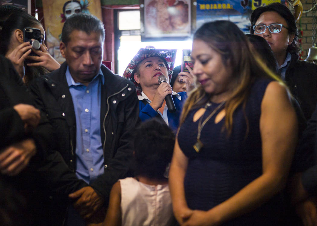 Susy Cazarin, who lost her son to an opioid overdose, asks a question about the opioid epidemic while talking with Democratic presidential candidate and former Texas congressman Beto O'Rourke, not ...