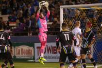 Las Vegas Lights FC goalkeeper Thomas Olsen (1) catches the ball during the second half of a United Soccer League match at Cashman Field in Las Vegas, Saturday, March 9, 2019. (Caroline Brehman/La ...
