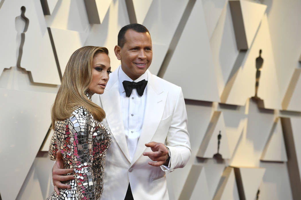 n this Feb. 24, 2019 file photo, Jennifer Lopez, left, and Alex Rodriguez arrive at the Oscars at the Dolby Theatre in Los Angeles. Barack Obama is feeling the love about the engagement of Lopez ...