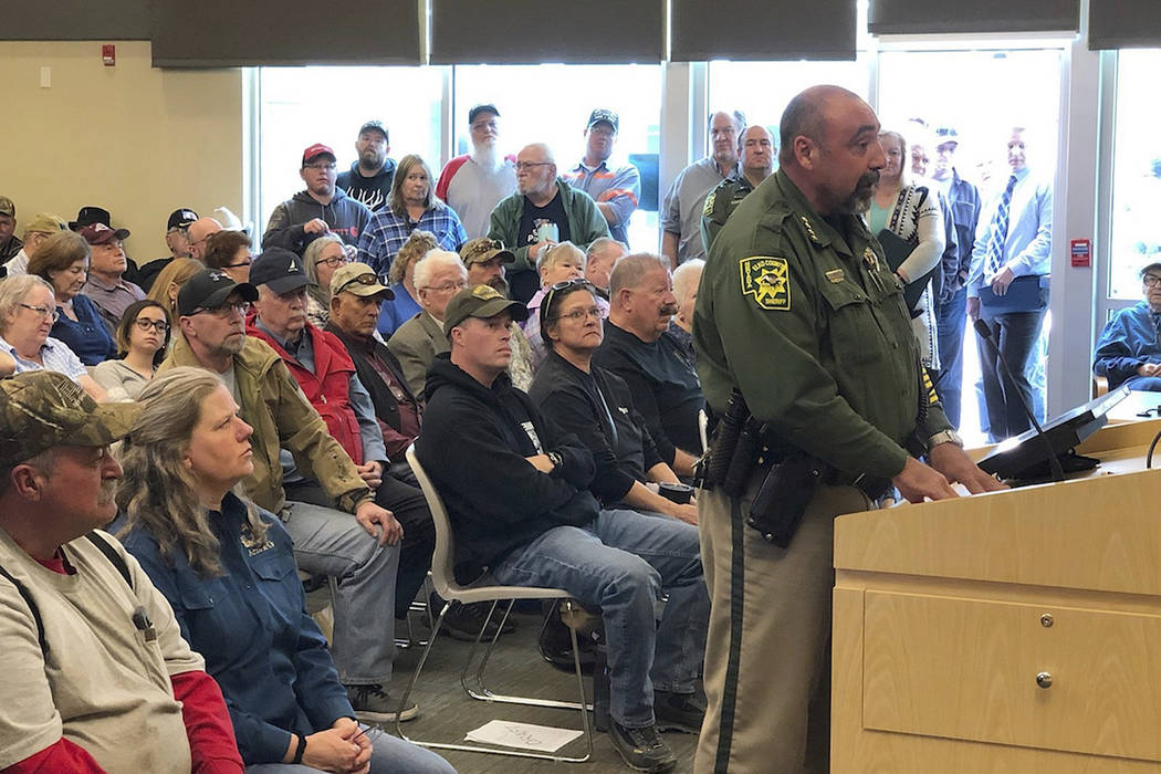 An overflowing crowd packs the Elko County Commission chamber as Sheriff Aitor Narvaiza presents his case for the county to declare a "Second Amendment sanctuary" in this photo take Wednesday, Mar ...