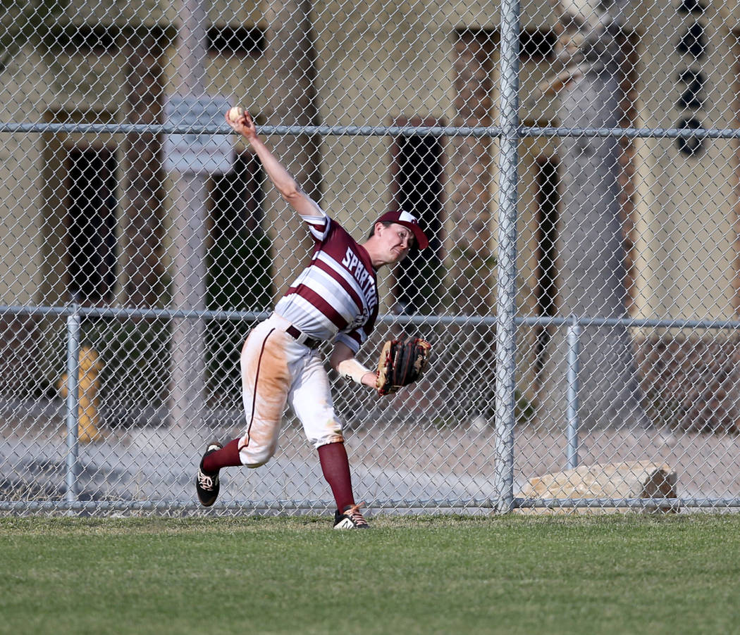 Cimarron-Memorial ourfielder Anthony Ortiz (12) throws in against Silverado in the fourth inning of their baseball game at Cimarron-Memorial High School in Las Vegas Friday, March 22, 2019. (K.M. ...