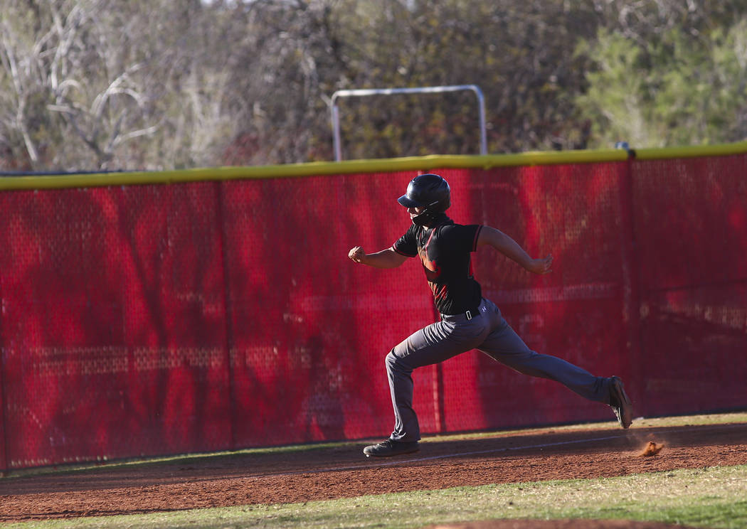 Las Vegas' Jacob Peters (24) runs to third base during a baseball game at Arbor View High Schoo ...