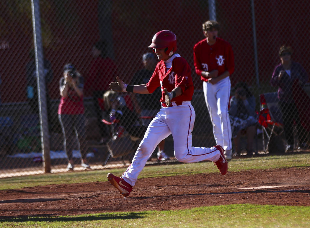 Arbor View's Nicholas Cornman (2) scores a run against Las Vegas during a baseball game at Arbo ...