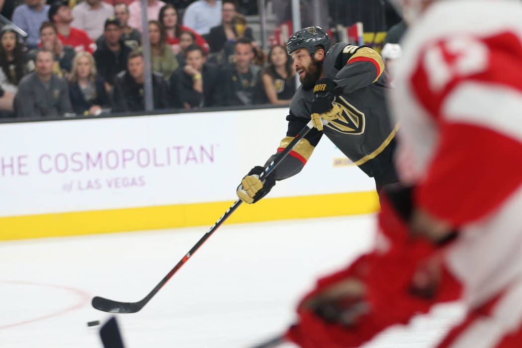 Vegas Golden Knights defenseman Deryk Engelland (5) takes a shot for a miss against Detroit Red Wings during the first period of an NHL hockey game at T-Mobile Arena in Las Vegas, Saturday, March ...