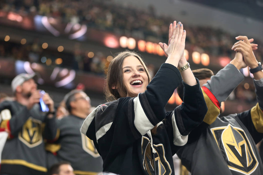 A fan celebrates a goal by Vegas Golden Knights center Cody Eakin (21) during the second period of an NHL hockey game at T-Mobile Arena in Las Vegas, Saturday, March 23, 2019. Erik Verduzco Las Ve ...