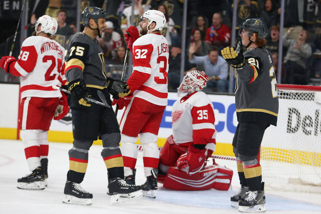 Vegas Golden Knights center Cody Eakin (21) celebrates his score with right wing Ryan Reaves (75) during the second period of an NHL hockey game at T-Mobile Arena in Las Vegas, Saturday, March 23, ...