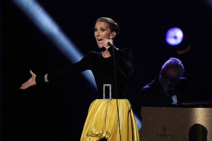 In this Sunday, Jan. 13, 2019, file photo, Celine Dion performs at the "Aretha! A Grammy Celebration For The Queen Of Soul" event at the Shrine Auditorium in Los Angeles. The special is set to air ...