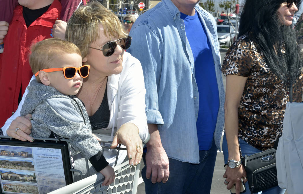 Ellis Hellums, 2, watches with his grandmother Brenda Clendenen during a visit by the Budweiser Clydesdales to the Smith’s Marketplace at 9710 W. Skye Canyon Park Drive in Las Vegas on Satu ...