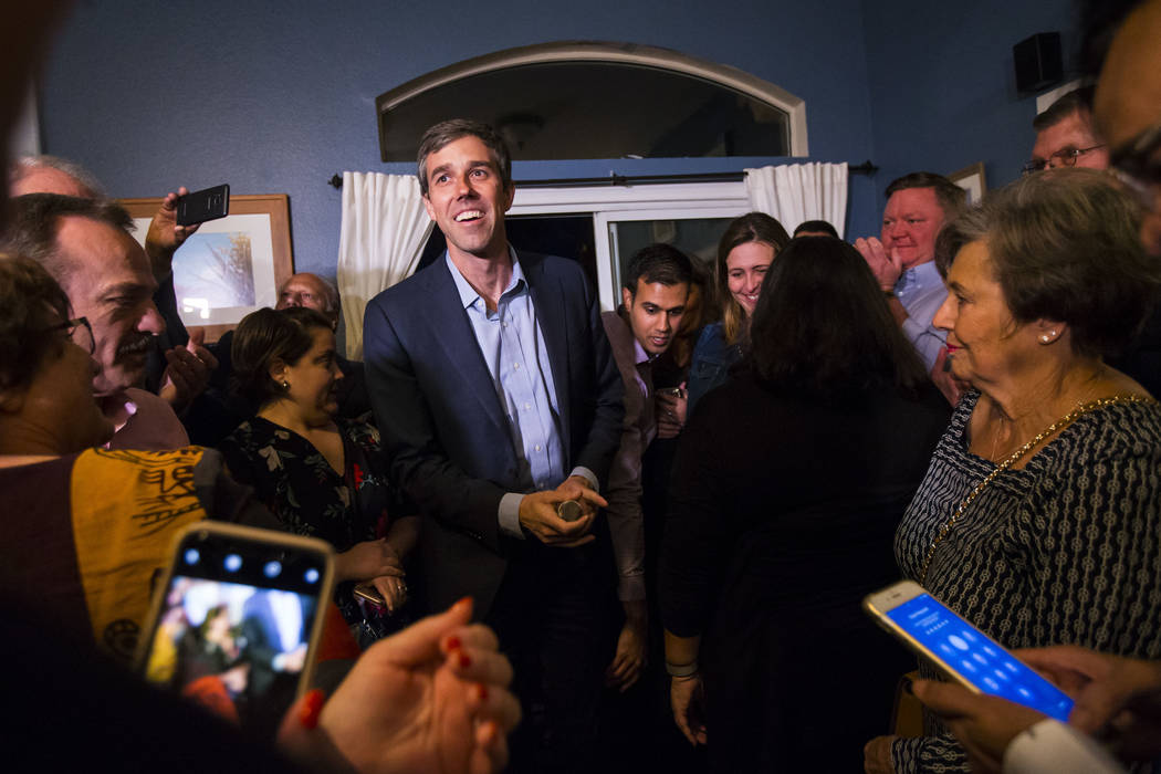 Democratic presidential candidate and former Texas congressman Beto O'Rourke is introduced during a campaign stop at a home in the Summerlin area of Las Vegas on Saturday, March 23, 2019. (Chase S ...