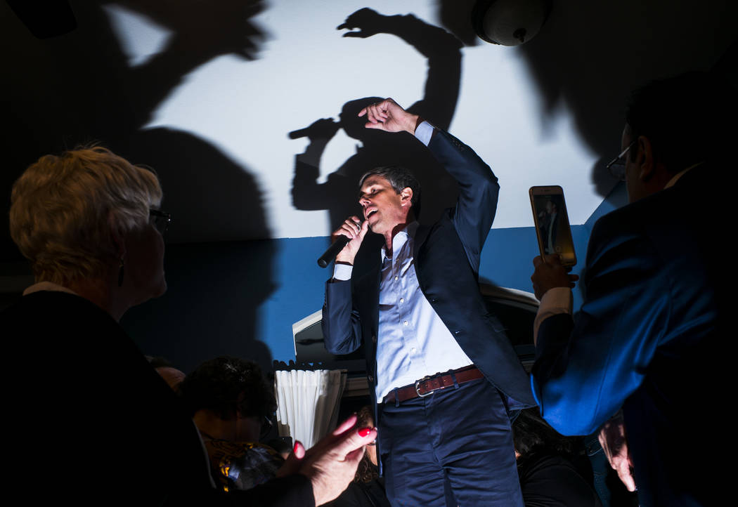 Democratic presidential candidate and former Texas congressman Beto O'Rourke addresses a gathering during a campaign stop at a home in the Summerlin area of Las Vegas on Saturday, March 23, 2019. ...