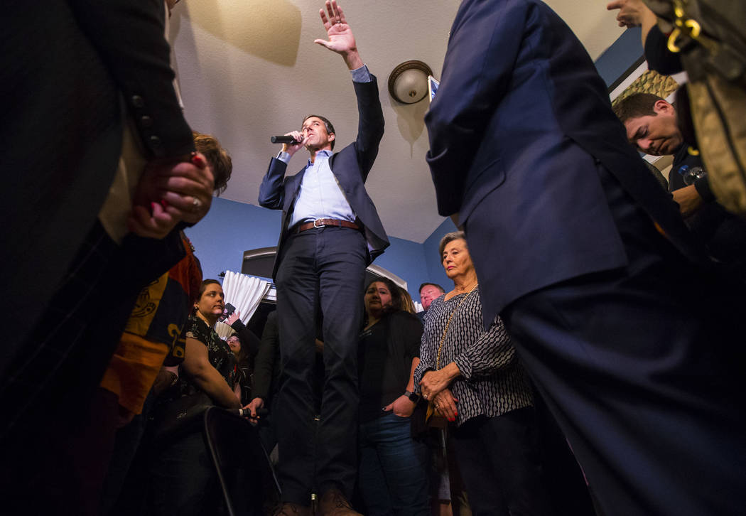 Democratic presidential candidate and former Texas congressman Beto O'Rourke addresses a gathering during a campaign stop at a home in the Summerlin area of Las Vegas on Saturday, March 23, 2019. ...