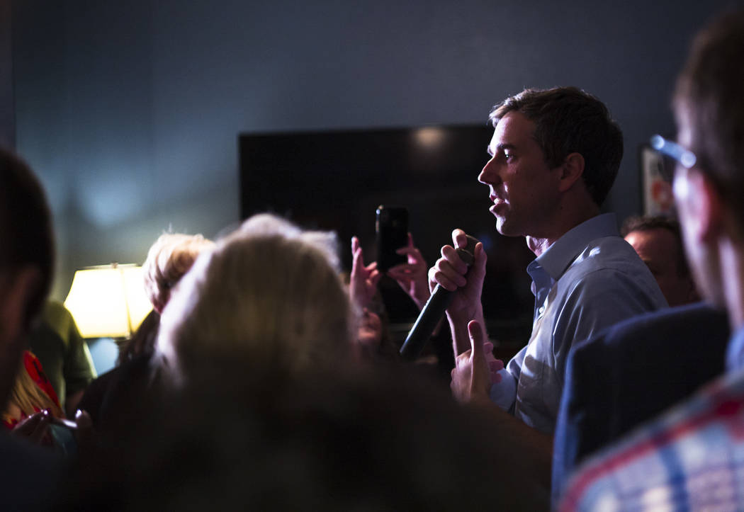 Democratic presidential candidate and former Texas congressman Beto O'Rourke responds to questions from attendees during a campaign stop at a home in the Summerlin area of Las Vegas on Saturday, M ...