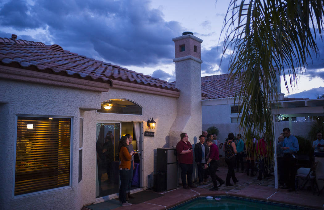 Attendees wait for the arrival of Democratic presidential candidate and former Texas congressman Beto O'Rourke at a home in the Summerlin area of Las Vegas on Saturday, March 23, 2019. (Chase Stev ...