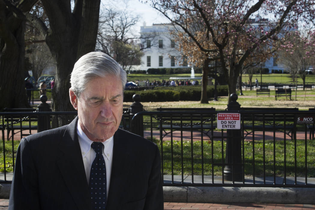 Special Counsel Robert Mueller walks past the White House after attending services at St. John's Episcopal Church, in Washington, Sunday, March 24, 2019. (AP Photo/Cliff Owen)