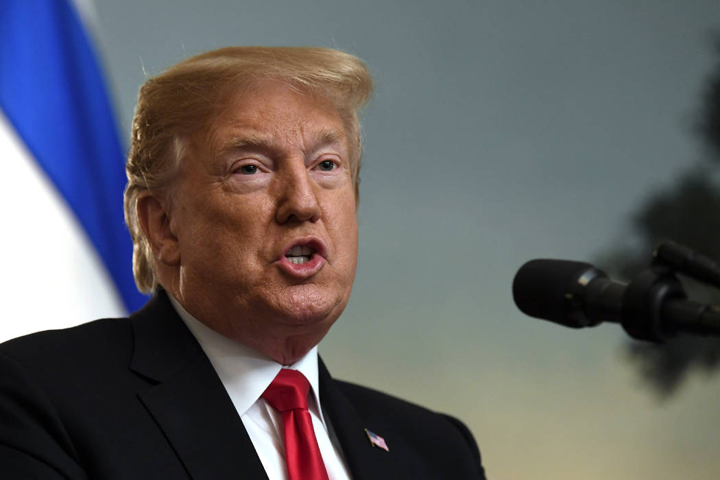 President Donald Trump speaks in the Diplomatic Reception Room Monday, March 25, 2019. Trump signed an official proclamation formally recognizing Israel's sovereignty over the Golan Heights. (AP P ...