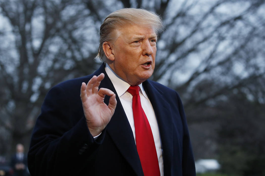President Donald Trump speaks with the media after stepping off Marine One on the South Lawn of the White House, Sunday, March 24, 2019, in Washington. The Justice Department said Sunday that spec ...