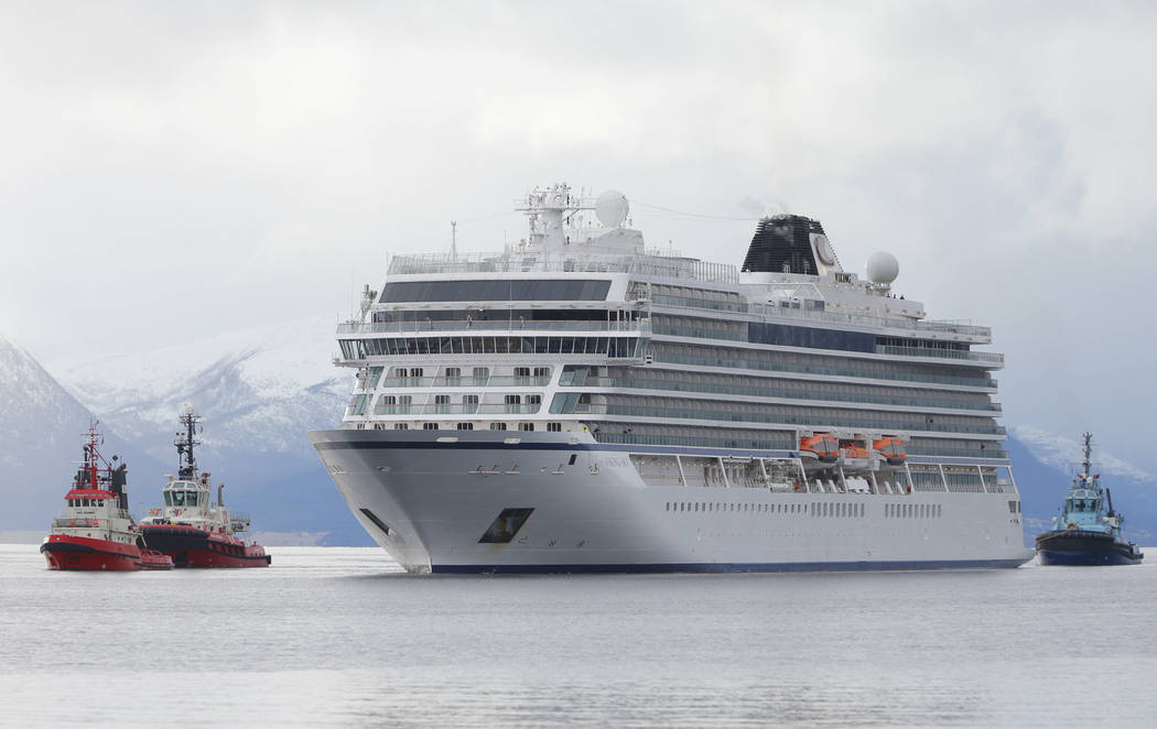 The cruise ship Viking Sky arrives at port off Molde, Norway, Sunday March 24, 2019, after the problems in heavy seas off Norway's western coast. Rescue helicopters took more than 475 passengers f ...