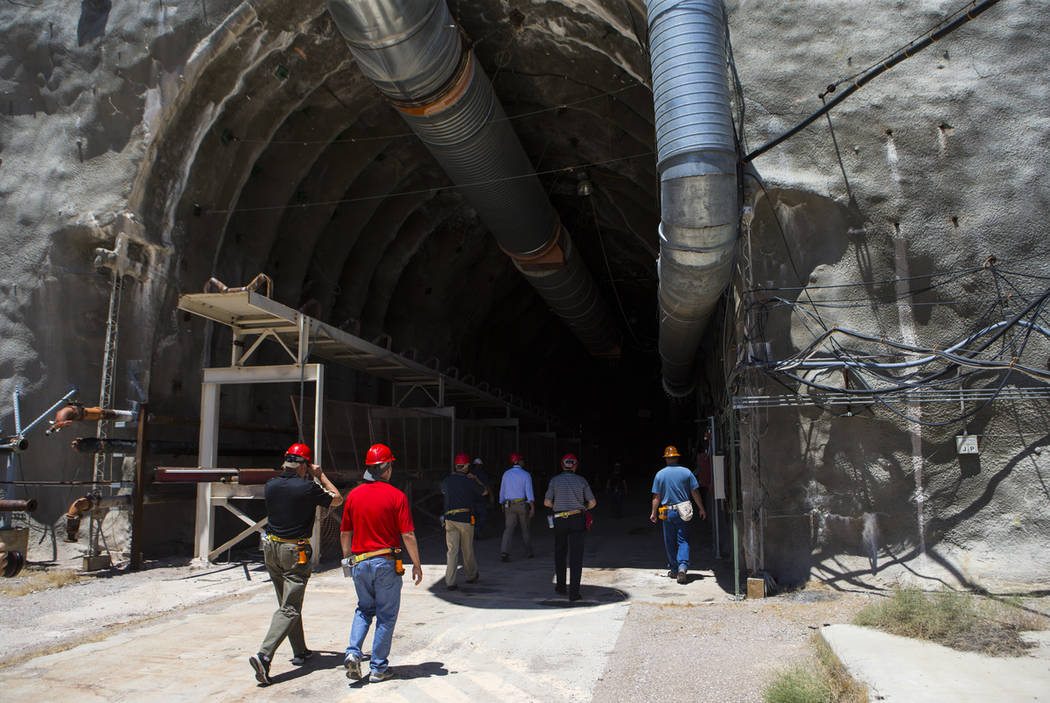 Members of a congressional tour make their way through the north portal of Yucca Mountain near Mercury on Saturday, July 14, 2018. (Chase Stevens/Las Vegas Review-Journal) @csstevensphoto
