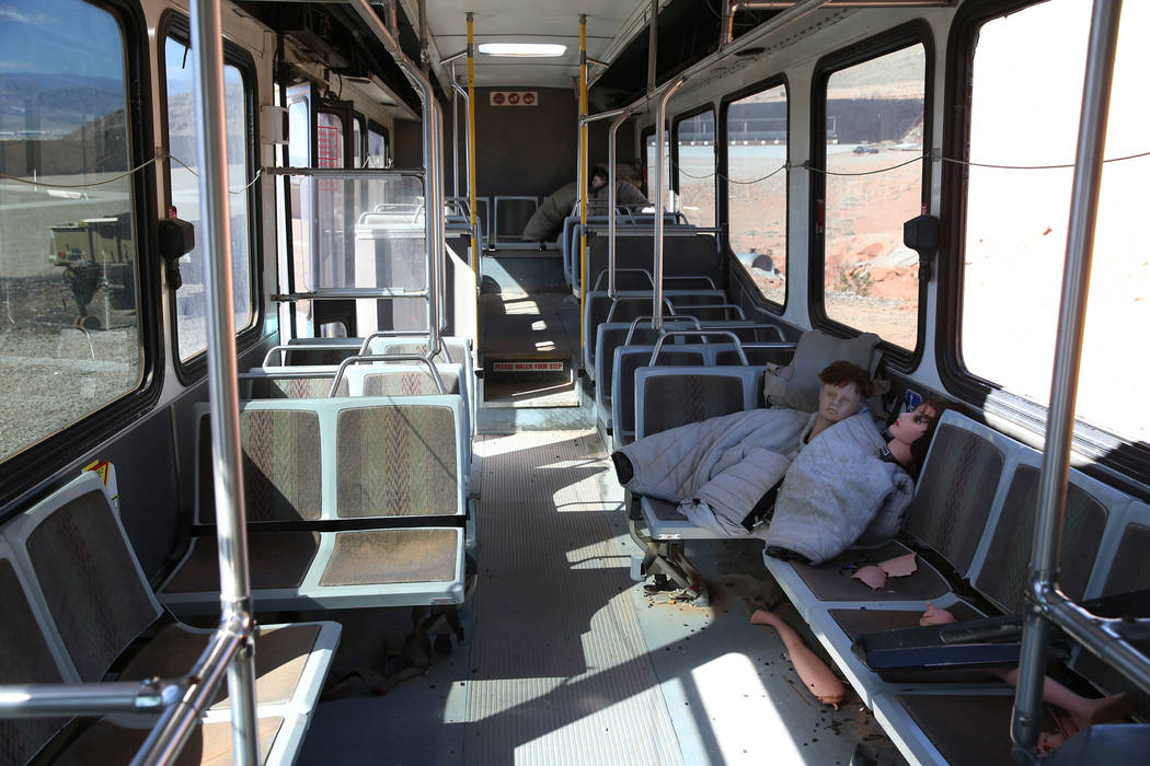Dummies are seen inside a bus donated to the Metropolitan Police Department firearms range for ...