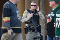 Metro officer Dallin Van Buskirk, armed with an AR-15 semi-automatic rifle with a scope, patrol ...