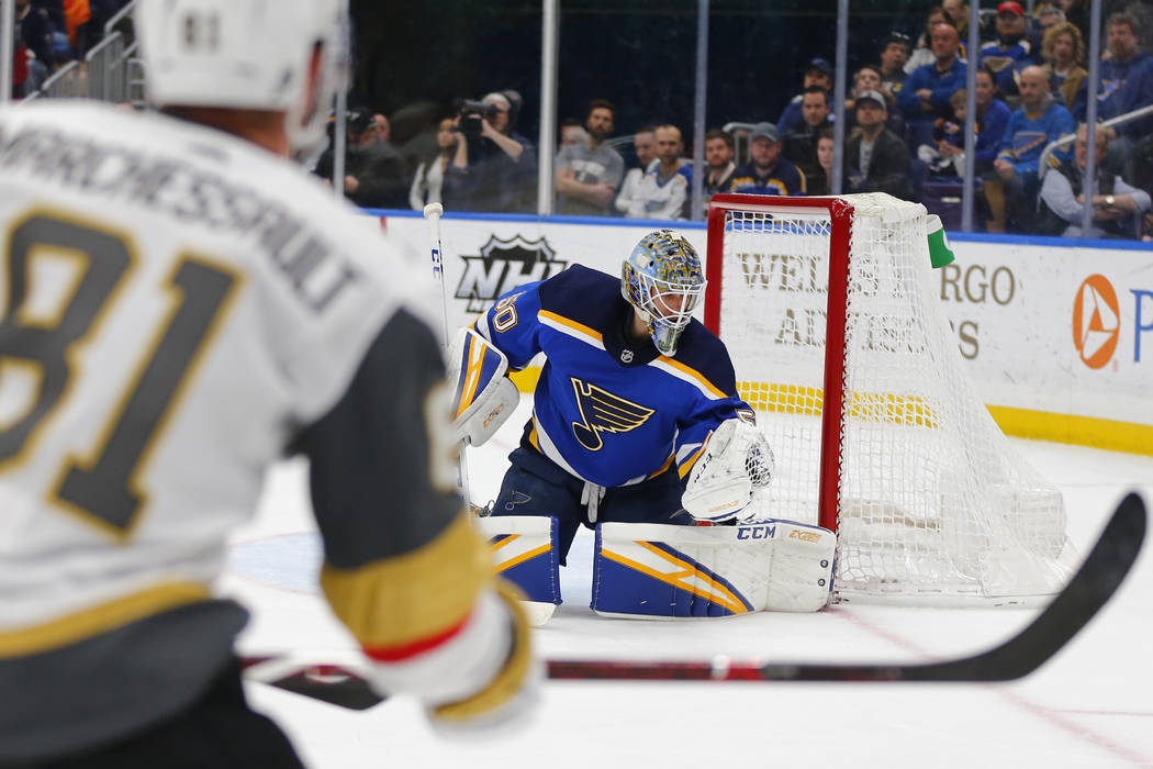 St. Louis Blues' goalie Jordan Binnington (50) makes a save against the Vegas Golden Knights during the first period of an NHL hockey game Monday, March 25, 2019, in St. Louis. (AP Photo/Dilip Vis ...