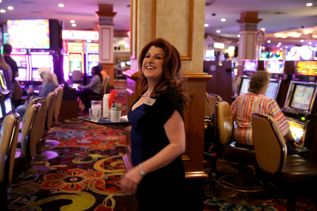 Twenty-five year cocktail server Ginger Glass-Trotter smiles at a customer  at Sam's Town Monday … | Las Vegas Review-Journal