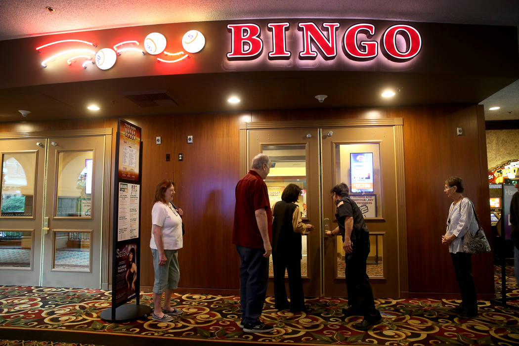 Customers wait for the doors to the bingo room to open at Sam's Town Tuesday, March 26, 2019. ( ...