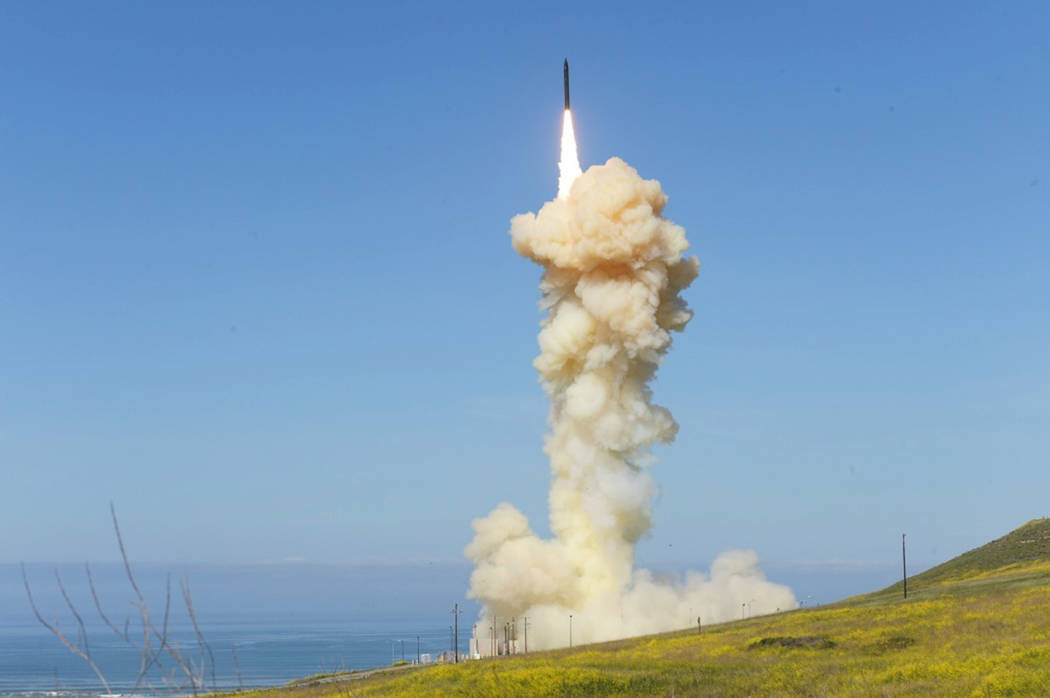 In this photo provided by the Missile Defense Agency, the lead ground-based Interceptor is launched from Vandenberg Air Force Base, Calif., in a "salvo" engagement test of an unarmed mis ...