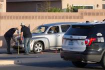 Law enforcement investigate a car accident at South Fort Apache Road and West Arby Avenue that left one minor dead and one hospitalized on Monday, March 25, 2019, in Las Vegas. (Benjamin Hager Rev ...