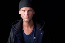 In this Aug. 30, 2013 file photo, Swedish DJ, remixer and record producer Avicii poses for a portrait, in New York. (Amy Sussman/Invision/AP, File)