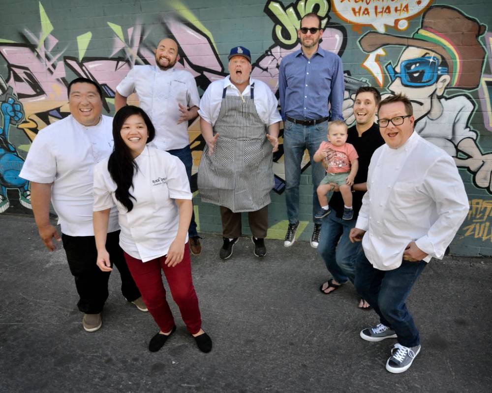 Some of the participants in Vegas UnStripped by Locals are shown outside of Esther’s Kitchen ...