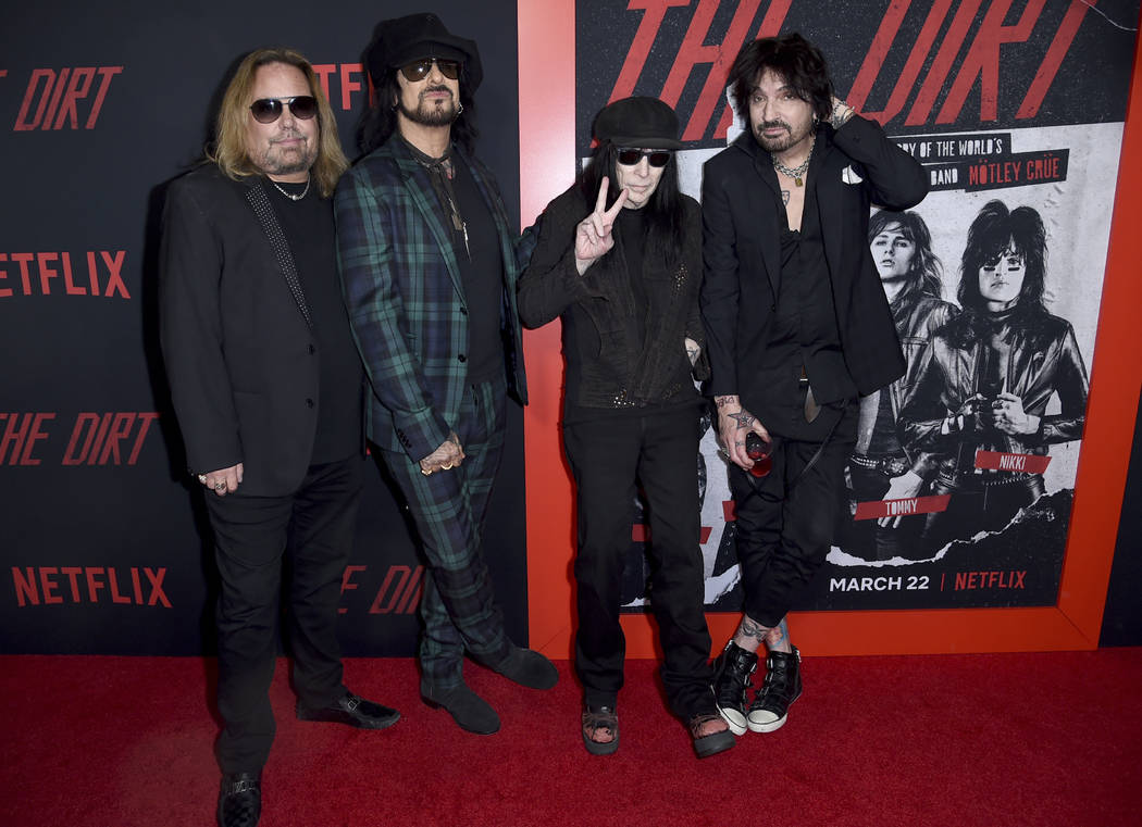 Vince Neil, from left, Nikki Sixx, Mick Mars and Tommy Lee, of Motley Crue, arrive at the world premiere of "The Dirt" on Monday, March 18, 2019, at ArcLight Hollywood in Los Angeles. (P ...