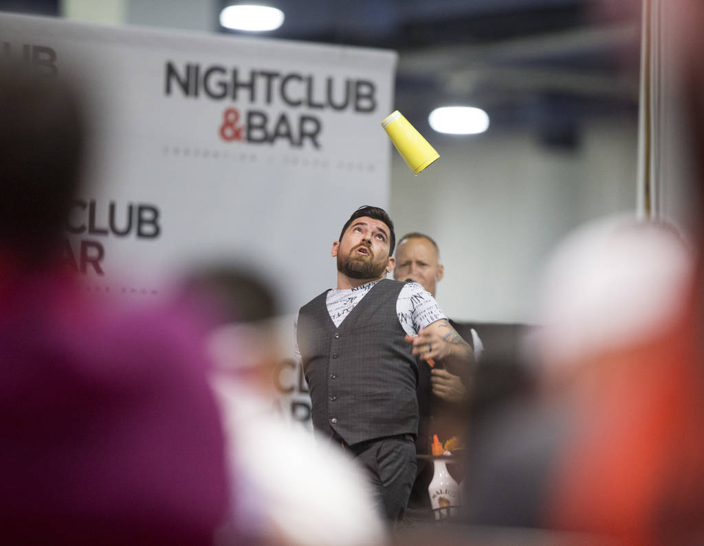 Mariano Gil performs in the flair bartending competition at the Nightclub and Bar Show on Tuesday, March 26, 2019, at the Las Vegas Convention Center, in Las Vegas. (Benjamin Hager Review-Journal) ...