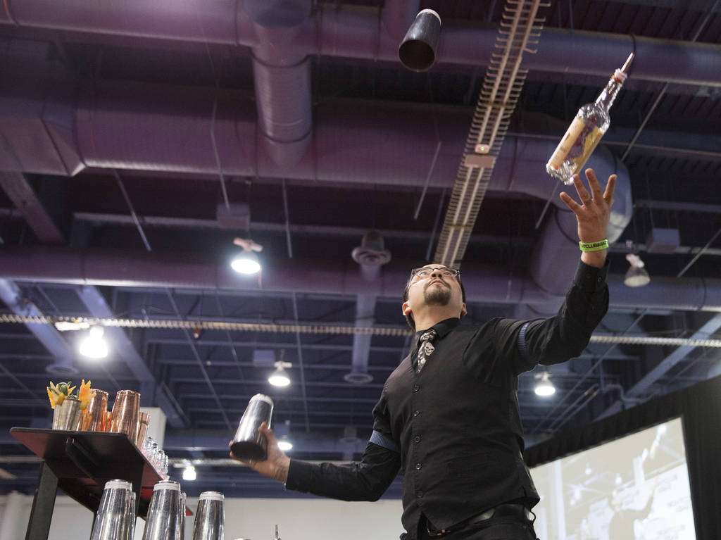Lorenzo Garcia performs in the flair bartending competition at the Nightclub and Bar Show on Tuesday, March 26, 2019, at the Las Vegas Convention Center, in Las Vegas. (Benjamin Hager Review-Journ ...
