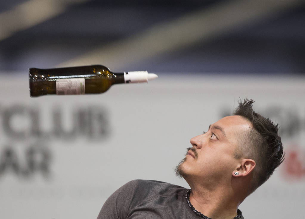 Michael Guzman performs in the flair bartending competition at the Nightclub and Bar Show on Tuesday, March 26, 2019, at the Las Vegas Convention Center, in Las Vegas. (Benjamin Hager Review-Journ ...