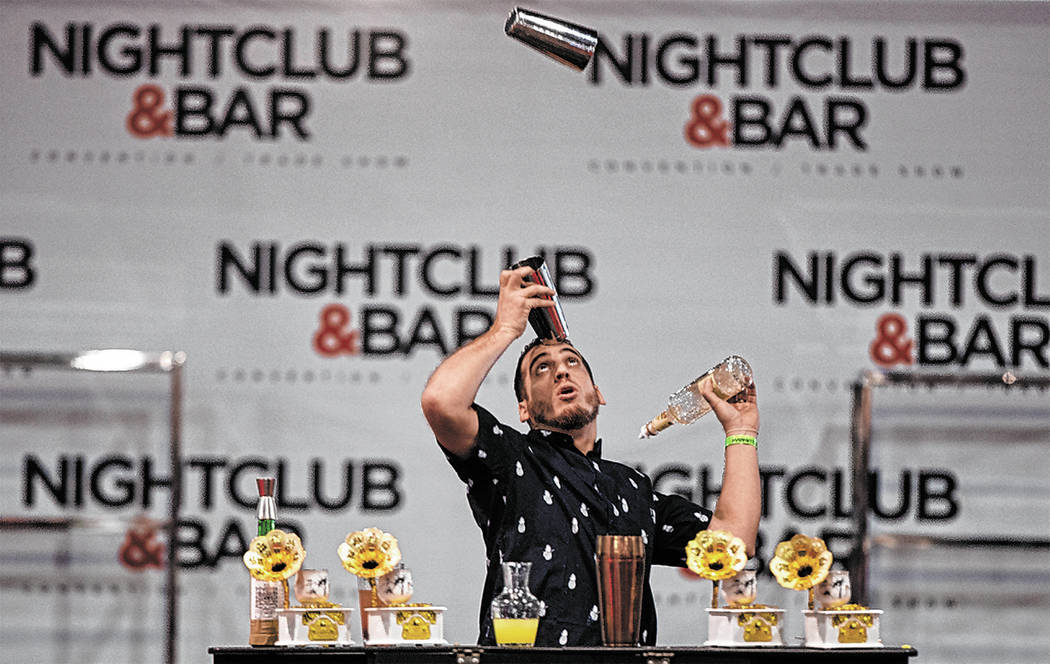 Harry Rivera performs in the flair bartending competition at the Nightclub and Bar Show on Tuesday, March 26, 2019, at the Las Vegas Convention Center, in Las Vegas. (Benjamin Hager Review-Journal ...