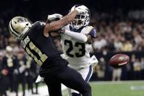 In this Jan. 20, 2019, file photo, Los Angeles Rams' Nickell Robey-Coleman breaks up a pass intended for New Orleans Saints' Tommylee Lewis during the second half of the NFL football NFC champions ...