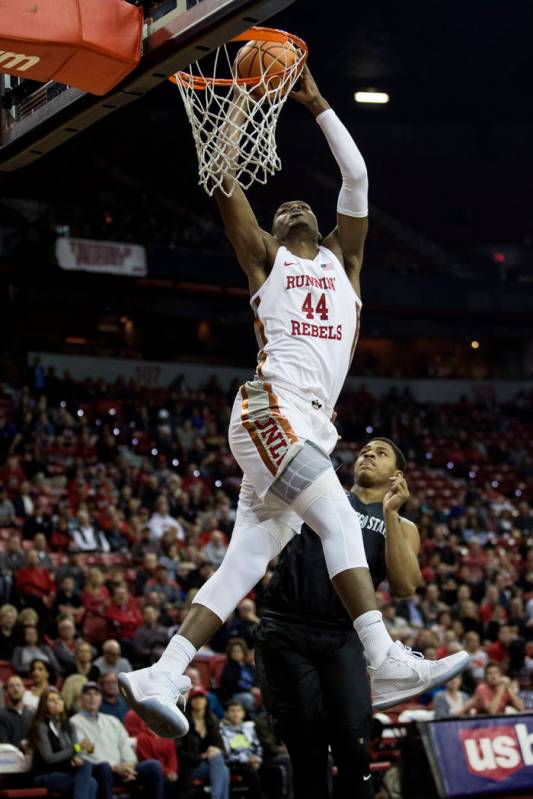 UNLV Rebels forward Brandon McCoy (44) dunks the ball against San Diego State Aztecs at the Thomas & Mack Center in Las Vegas, Saturday, Jan. 27, 2018, as San Diego State Aztecs forward Matt M ...