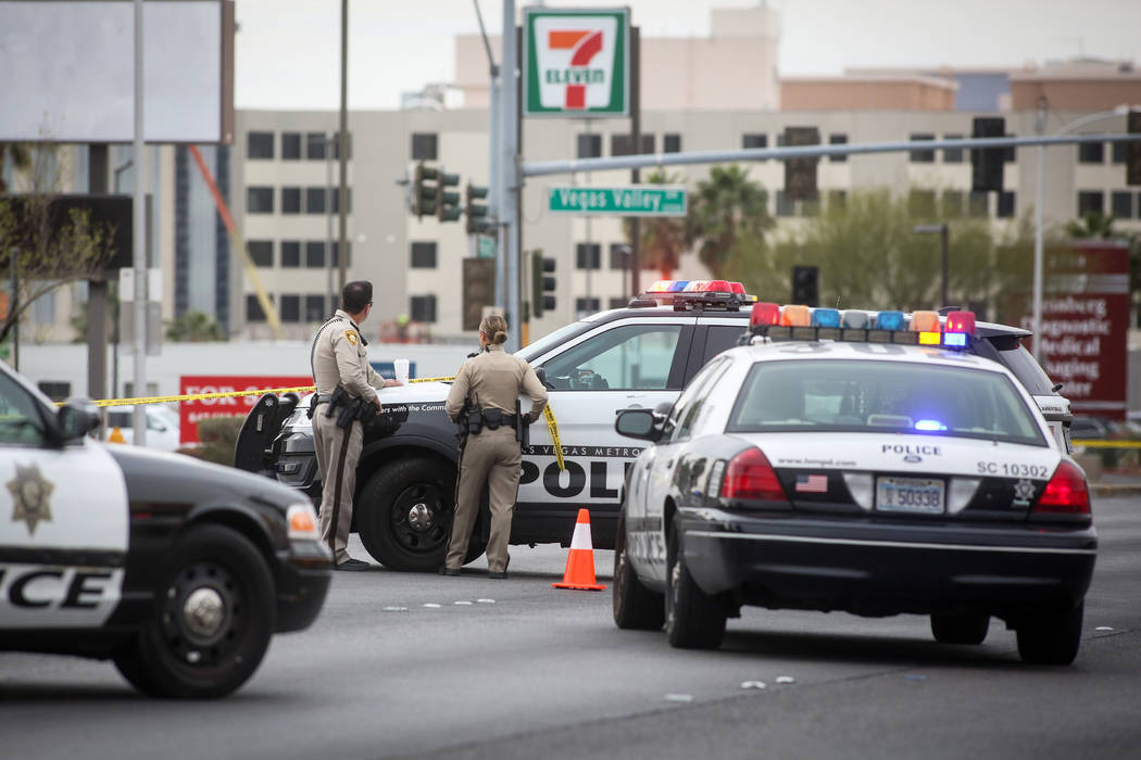 Las Vegas police investigate an officer involved shooting at a 7-Eleven on the corner of Maryla ...