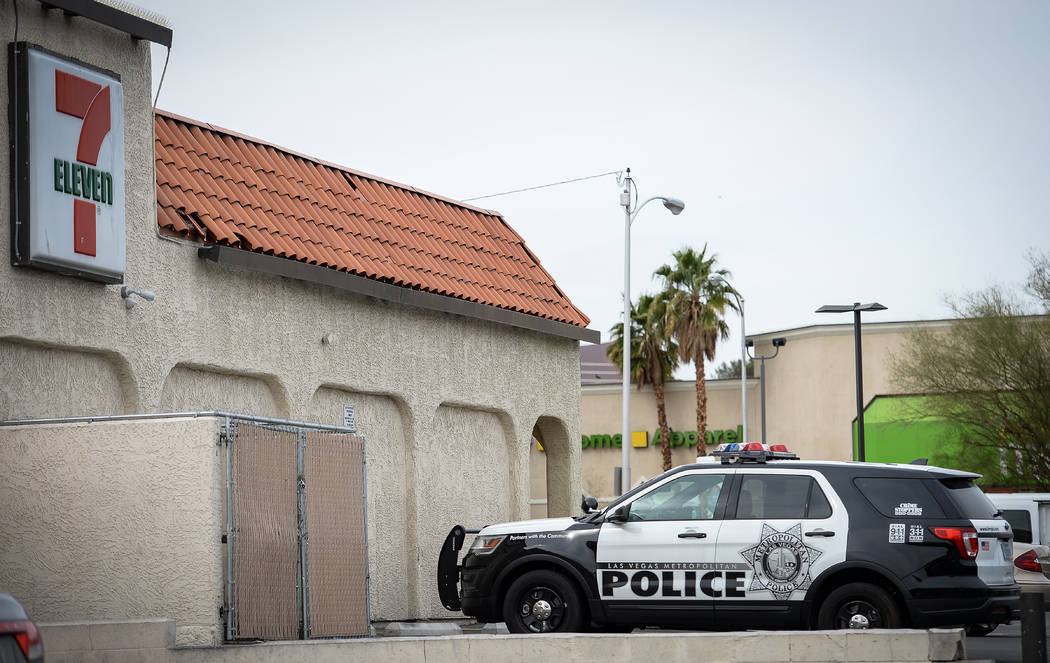 Las Vegas police investigate an officer involved shooting at a 7-Eleven on the corner of Maryla ...