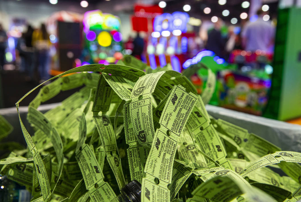 A pile of spent game tickets fills a trash can during the the Amusement Expo at the Las Vegas C ...