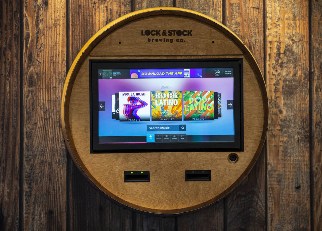 The Fusion Barrel Edition music player by TouchTunes on display during the the Amusement Expo a ...